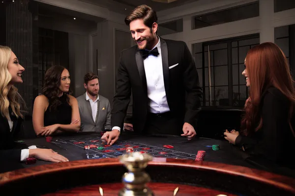 A person using their device against a moody casino-themed background, illustrating the smooth re-entry process at HHBDBAJE.